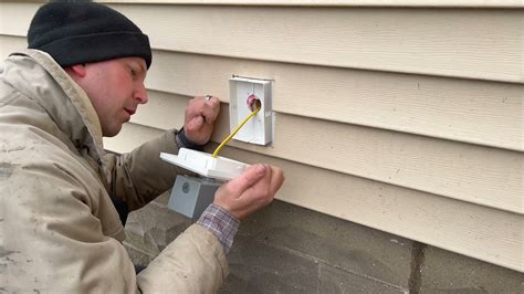 add surface mount electrical box to vinyl siding|vinyl siding outlet box installation.